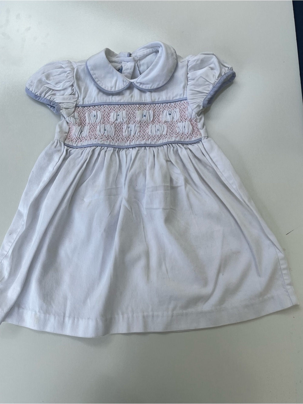 Classic White Smocked Baby Dress with Pink Detail